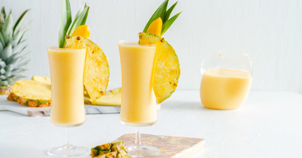Mango Piña Colada Cocktail - Frozen Fruity Cocktail Recipe Spoonabilities