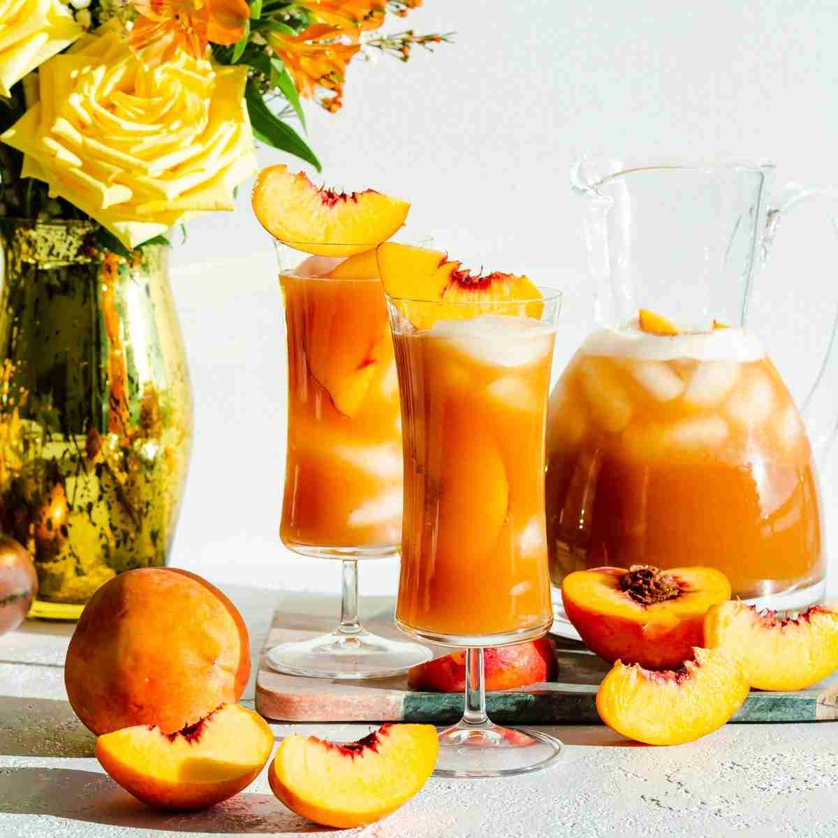 https://www.spoonabilities.com/wp-content/uploads/2021/06/Bourbon-Peach-Iced-Tea-Featured-Image.jpg
