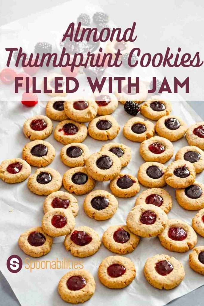 https://www.spoonabilities.com/wp-content/uploads/2022/01/Almond-Thumbprint-Cookies-filled-with-Jam-Spoonabilities-2-683x1024.jpg